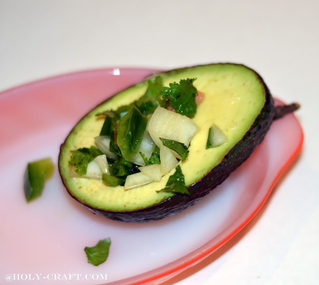 pico de gallo in a stuffed avocado