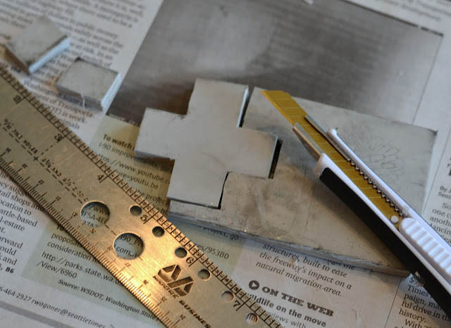 rubber cut with an exacto knife to create a one of a kind stamp rubber stamp