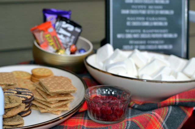 backyard gourmet s'mores bar with charcoal BBQ grill