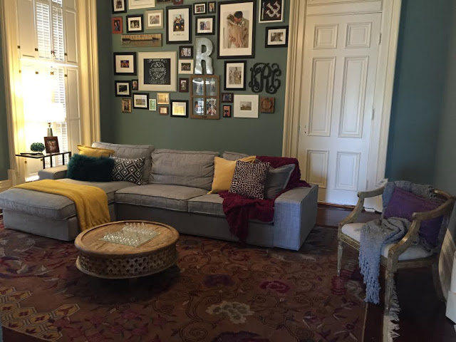 gallery wall in the sitting room of a historic mansion fixer upper, rehab addict, historic home