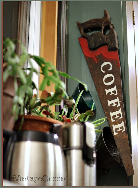 A Vintage Green saw blade coffee sign
